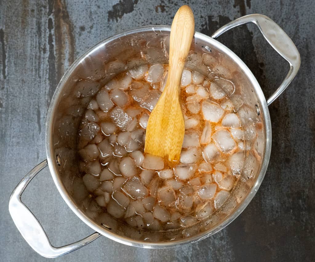 ice added to pot of turkey brine