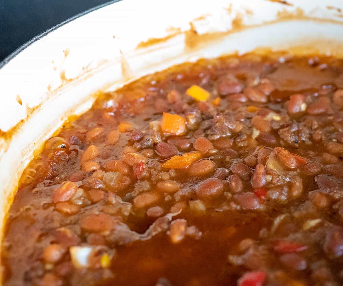pot of baked beans bubbling around edges.