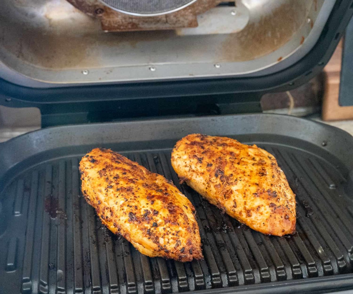 two chicken breasts on a Ninja Foodi Grill. 