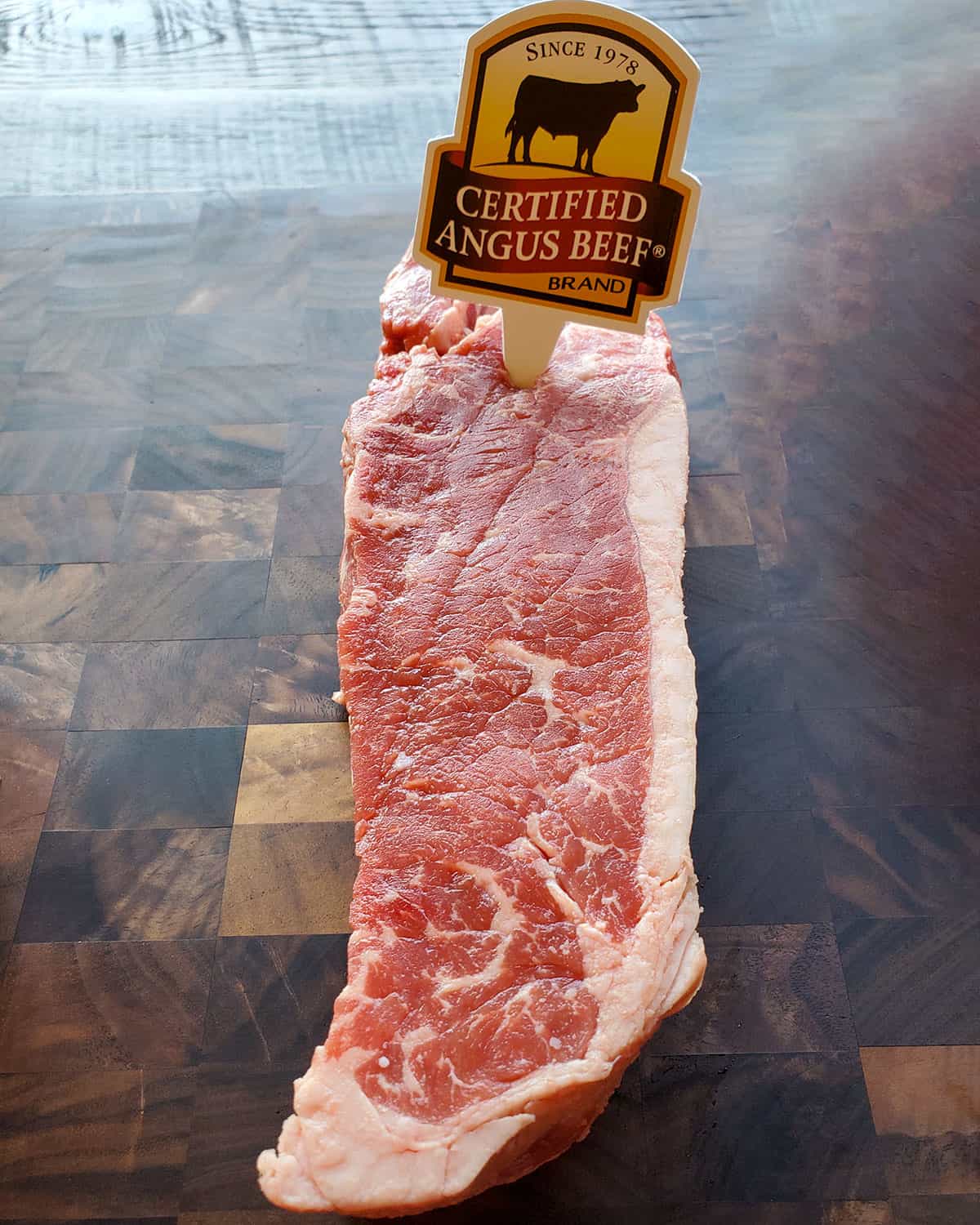 Certified Angus Beef brand ribeye choice grade with moderate marbling.