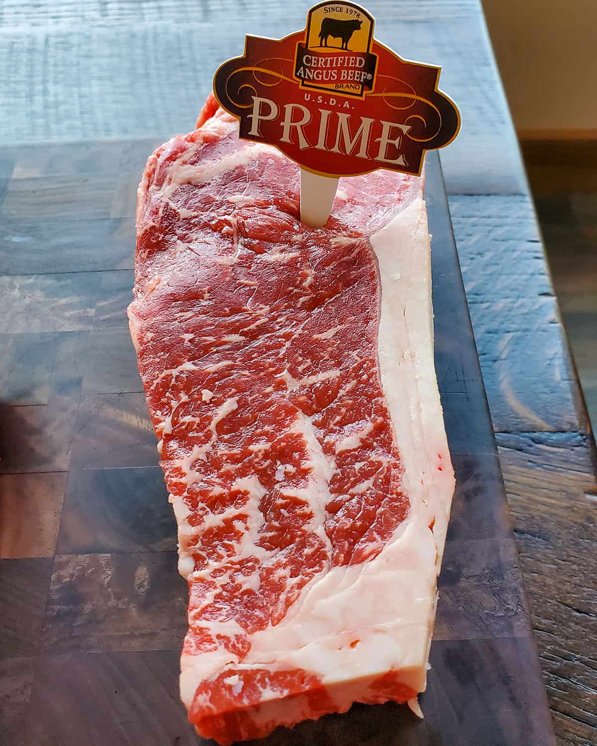 Certified Angus Beef brand prime ribeye with abundant marbling.