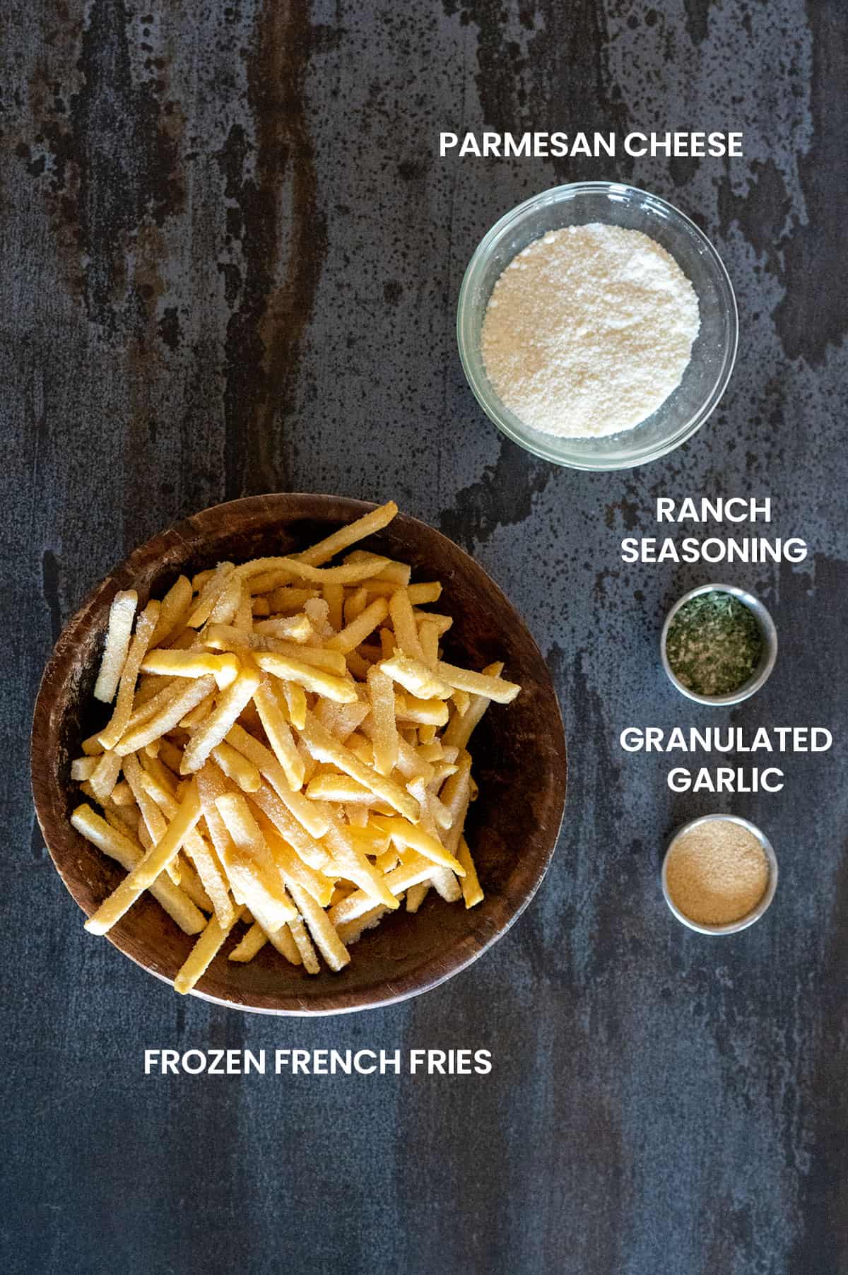 Garlic Parmesan Ranch Fries Ingredients: frozen fries, parmesan cheese, ranch seasoning, granulated garlic.
