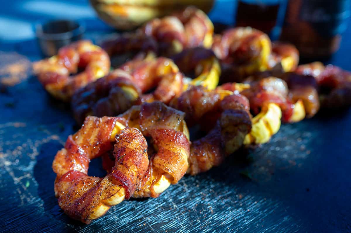 Bacon Wrapped Grilled Delicata Squash Rings on platter.
