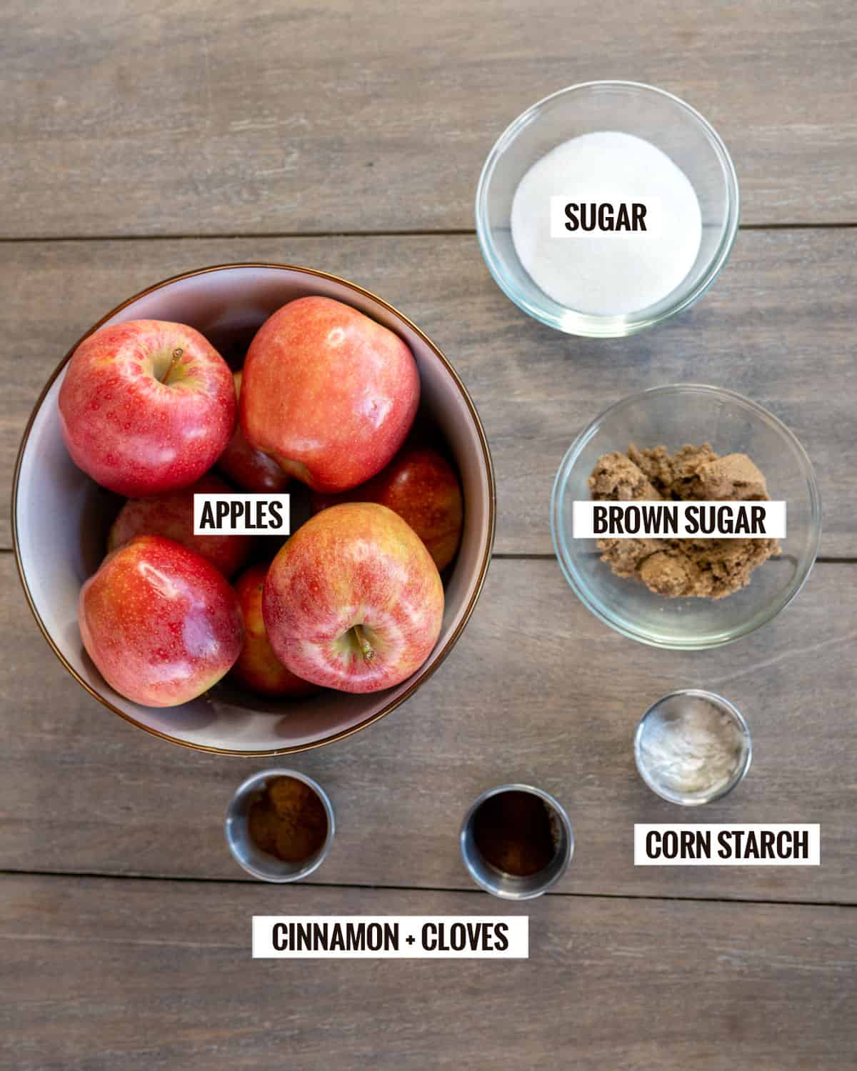 apple pie ingredients: apples, sugar, brown sugar, corn starch, cinnamon, cloves.