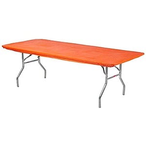 orange elastic tablecloth on table.