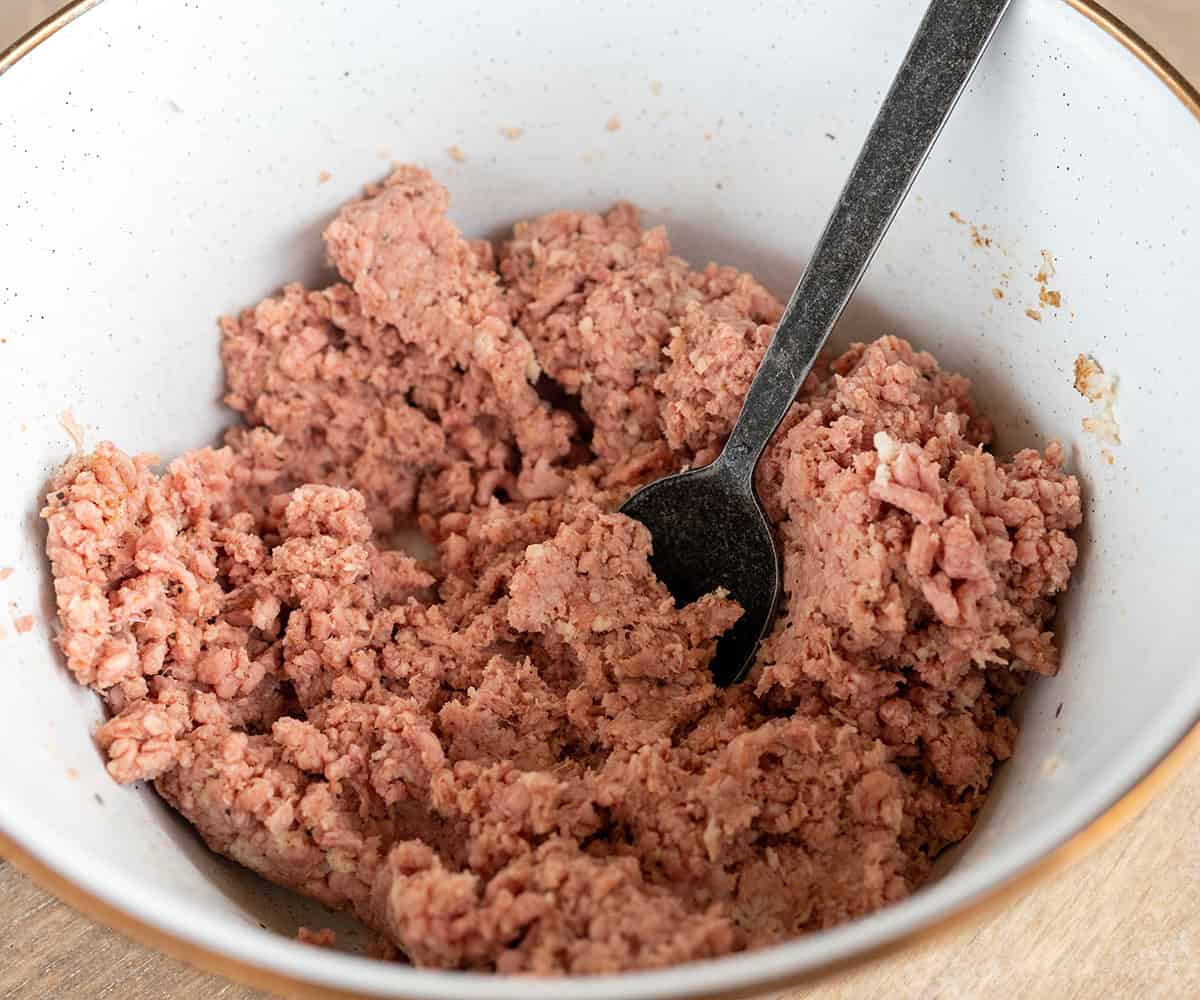 ground beef mixed with milk and breadcrumbs.