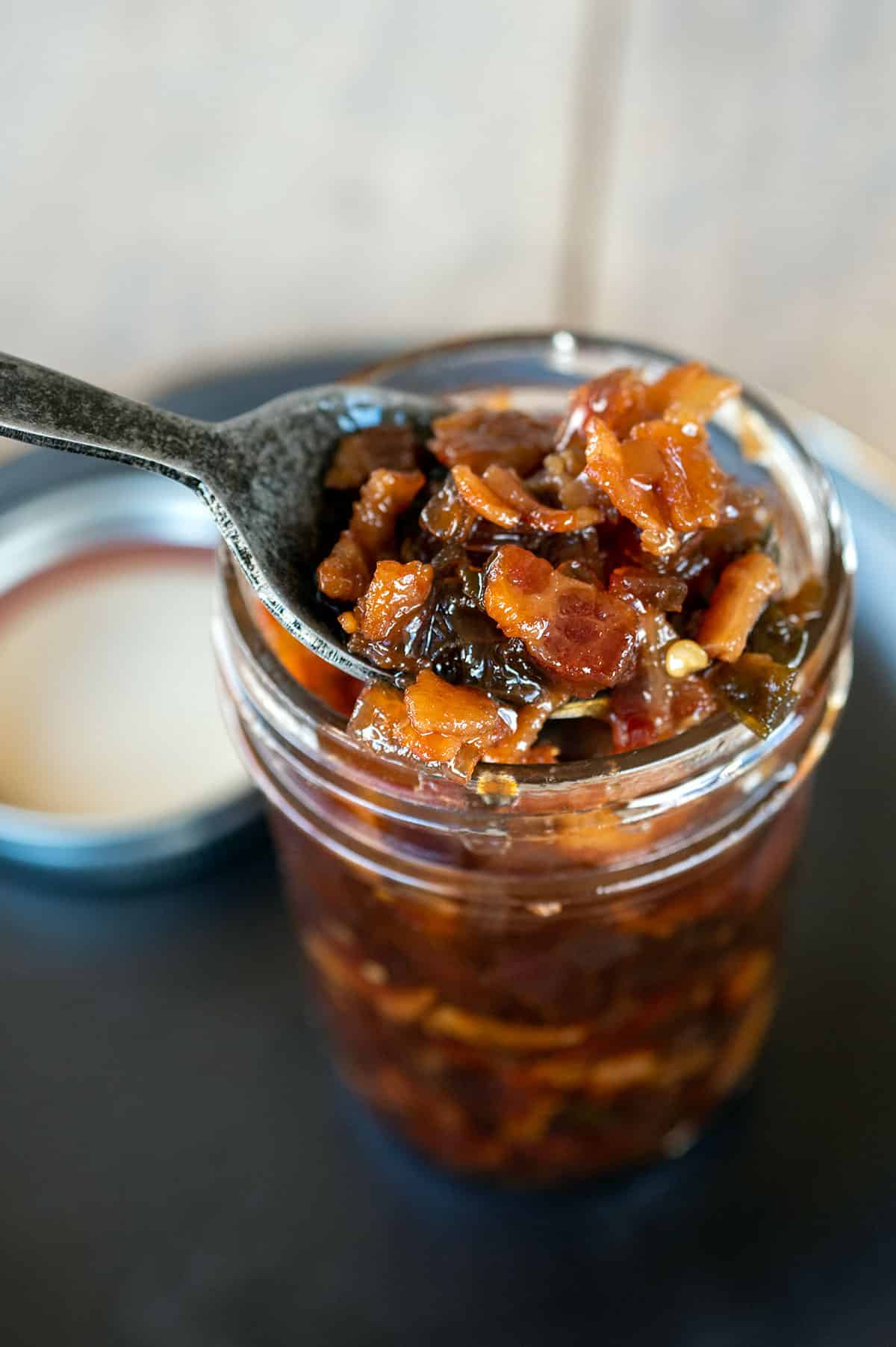 spoonful of bacon jam from jar.