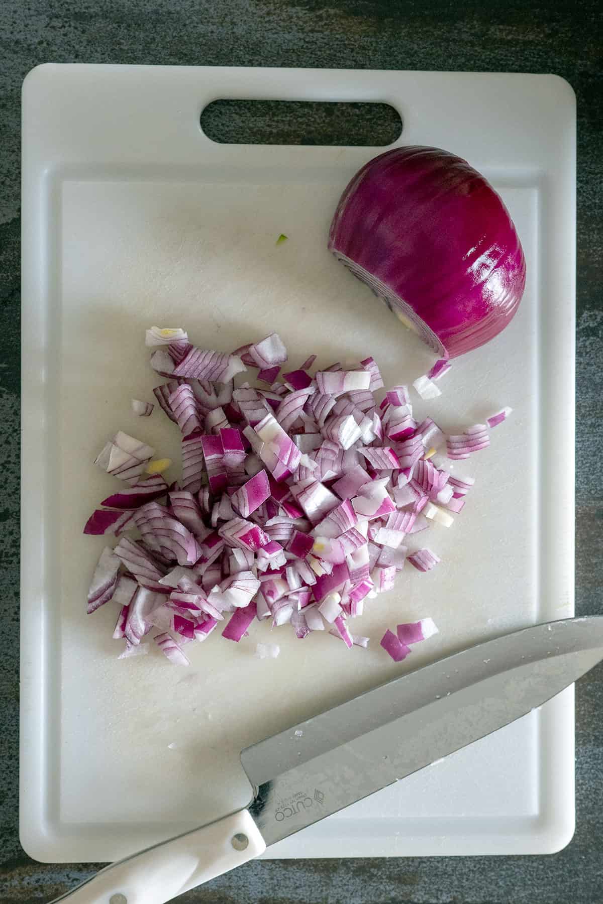 red onion on cutting board diced.