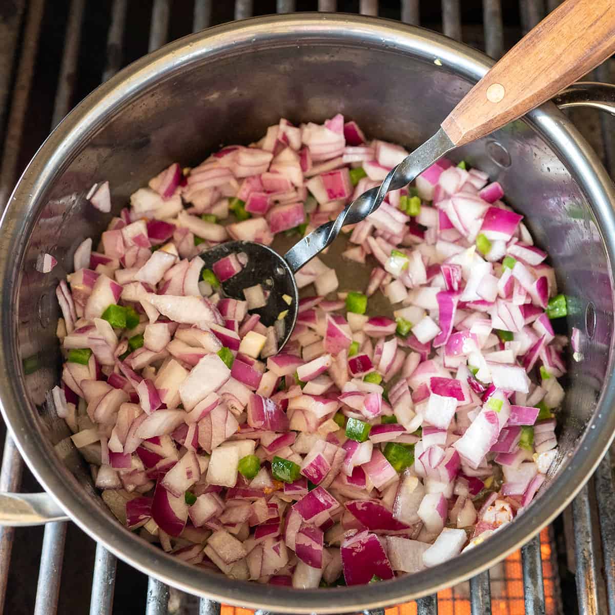 red onion and jalapeno in pot.