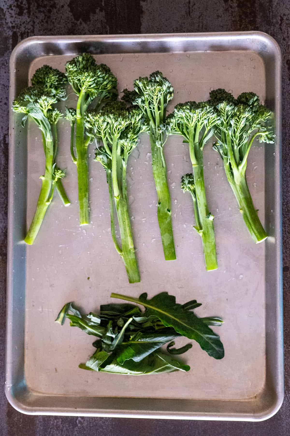 leaves removed from raw broccolini.