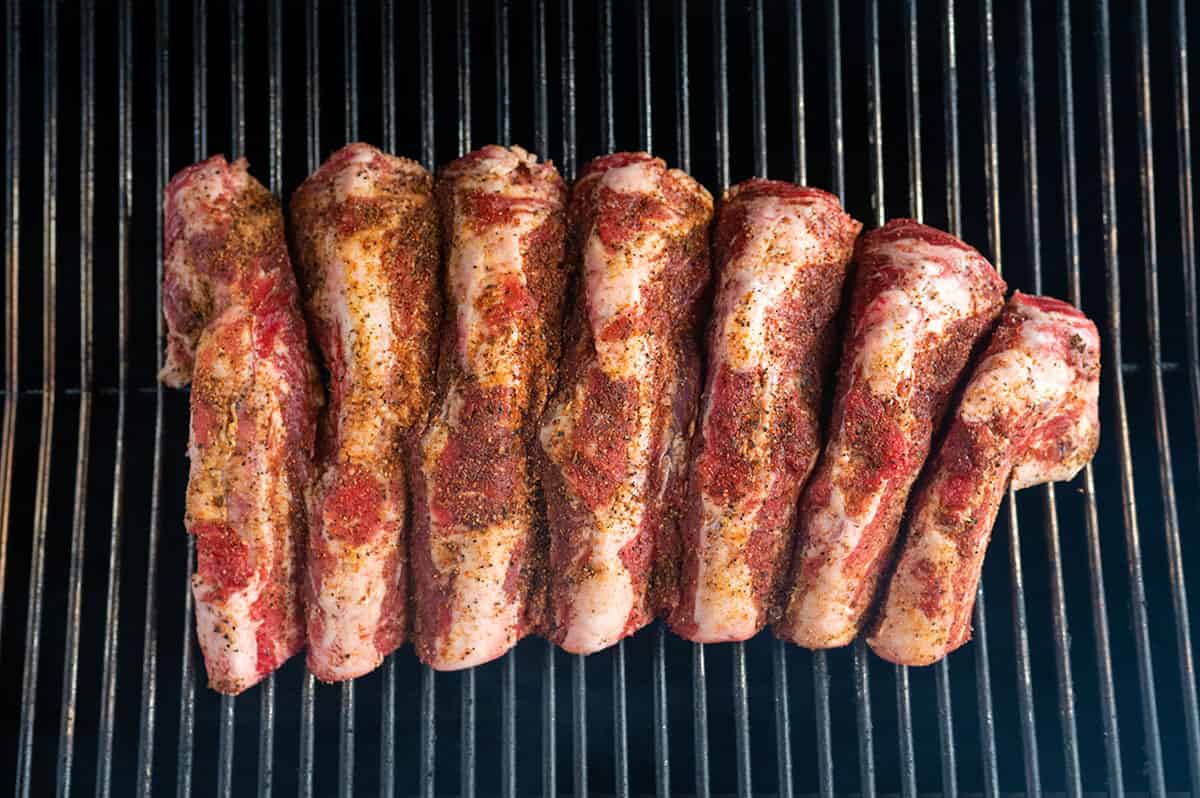 seasoned beef back ribs on grill.