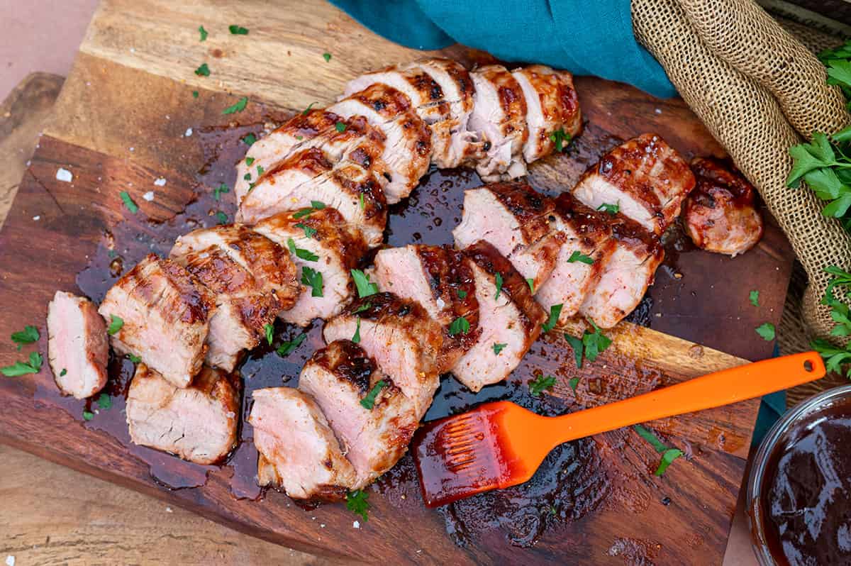 platter of sliced grilled pork tenderloin.