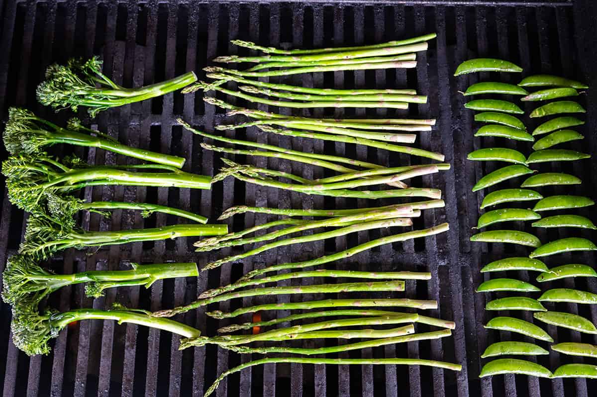 broccolini, asparagus and snap peas on grill.