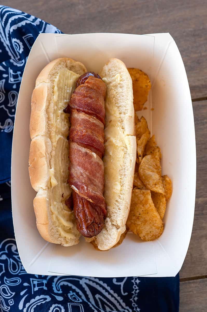 bacon-wrapped hot dog in a bun.