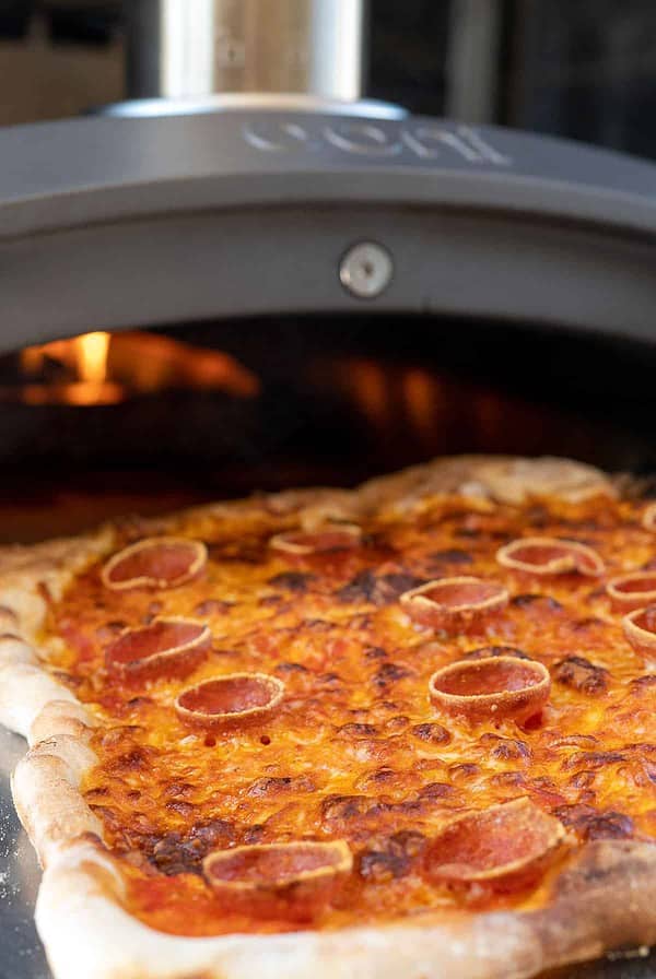 Pizza coming out of Ooni oven