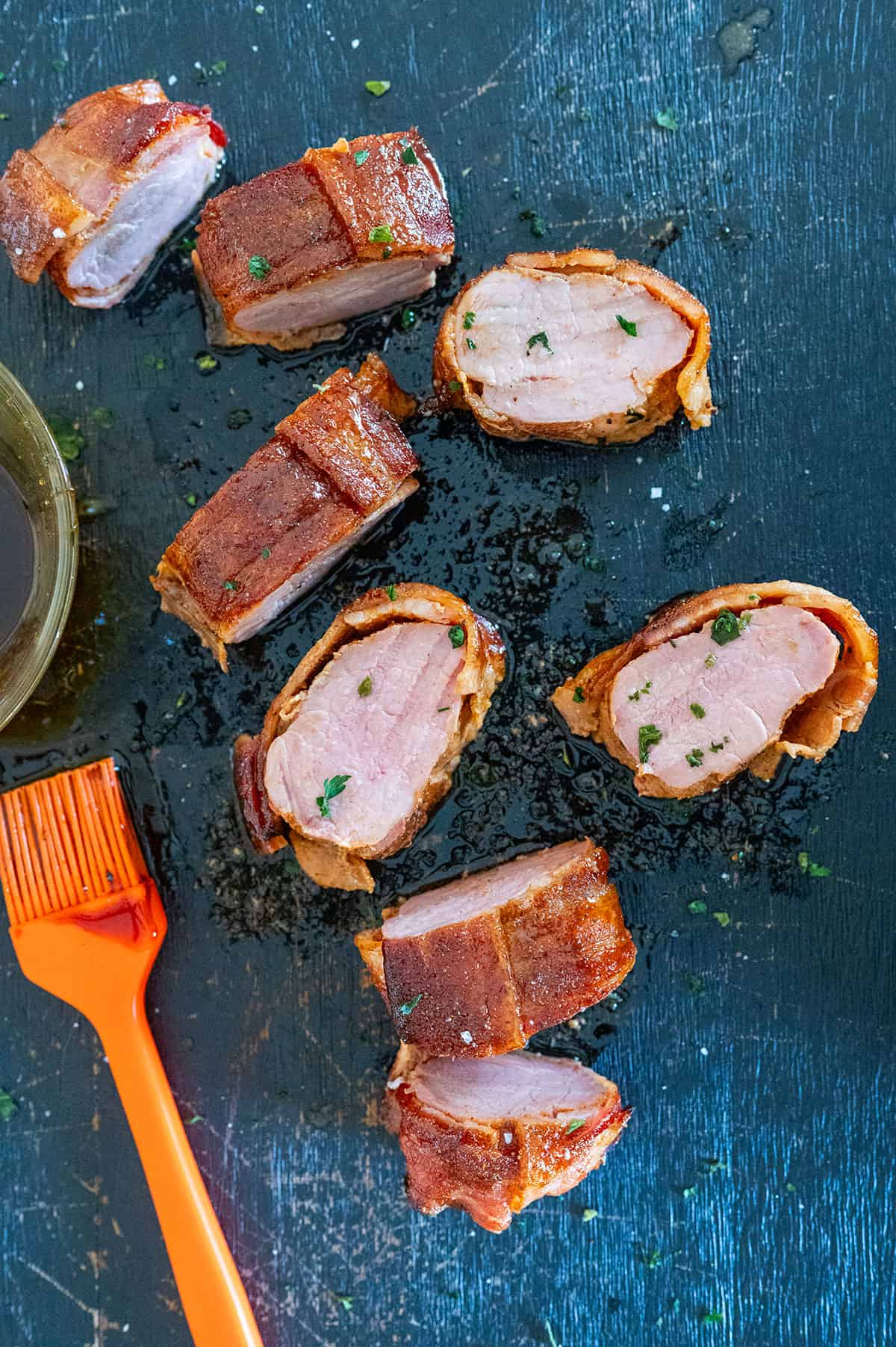 sliced bacon-wrapped pork tenderloing.