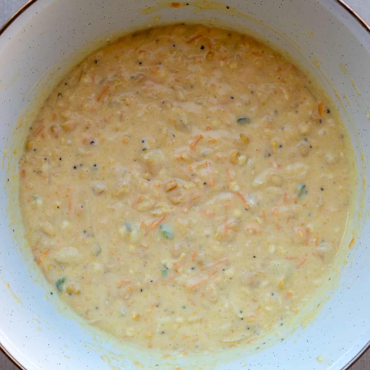 corn pudding ingredients mixed together.
