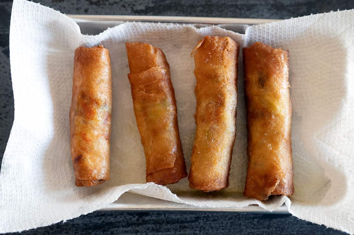 Fried lumpia on paper towel to drain grease.