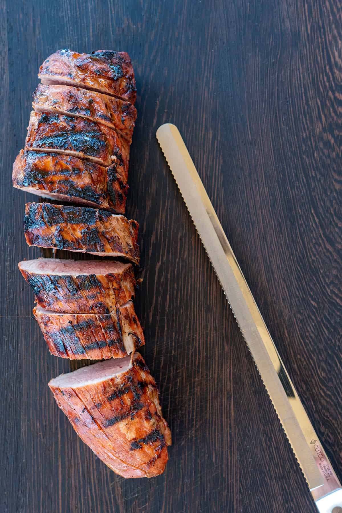 Filipino BBQ Pork Tenderloin sliced one-inch thick.