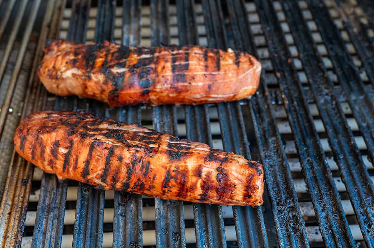 Filipino BBQ Pork Tenderloin on grill over indirect heat.