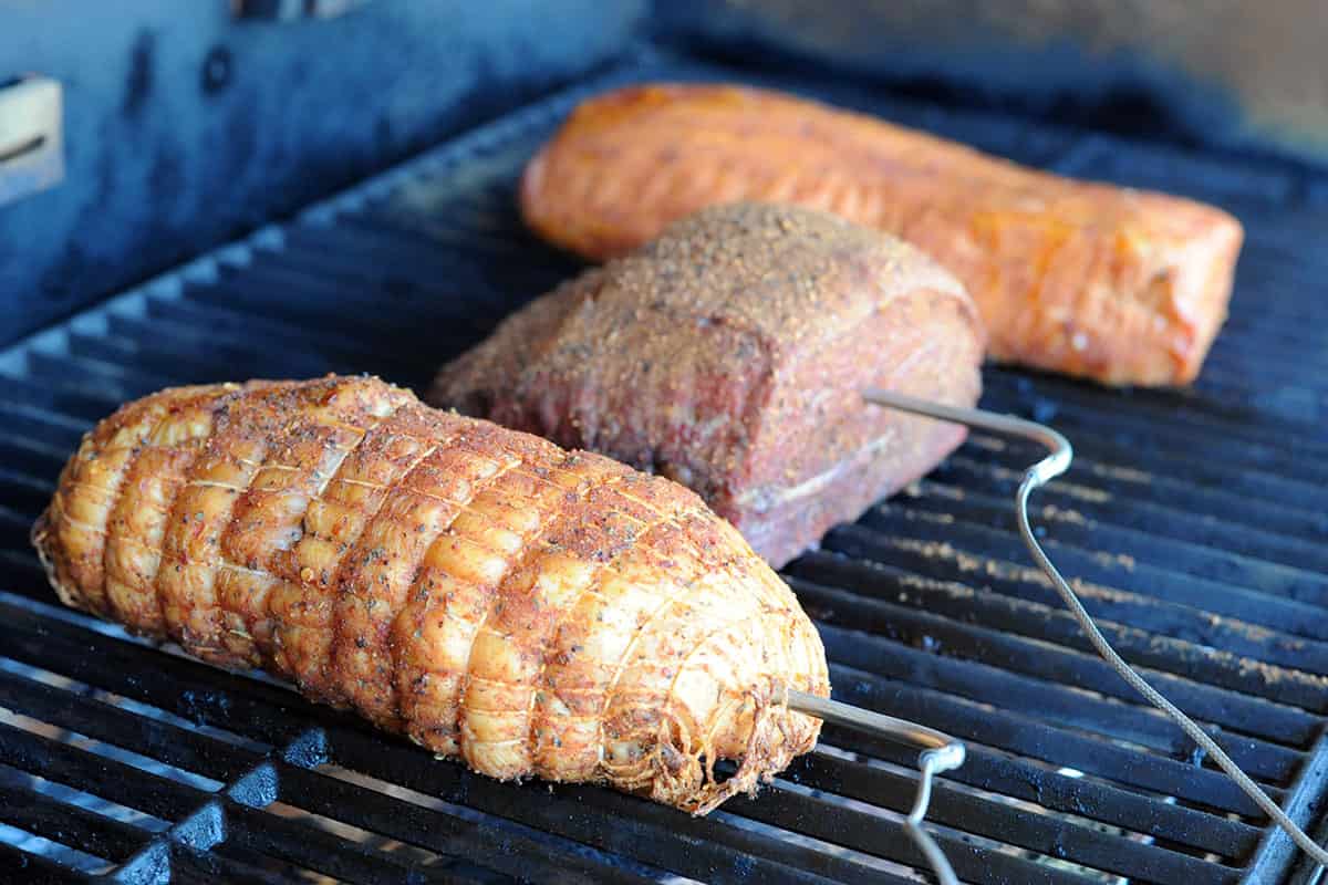 turkey, roast beef and pork loin on smoker.