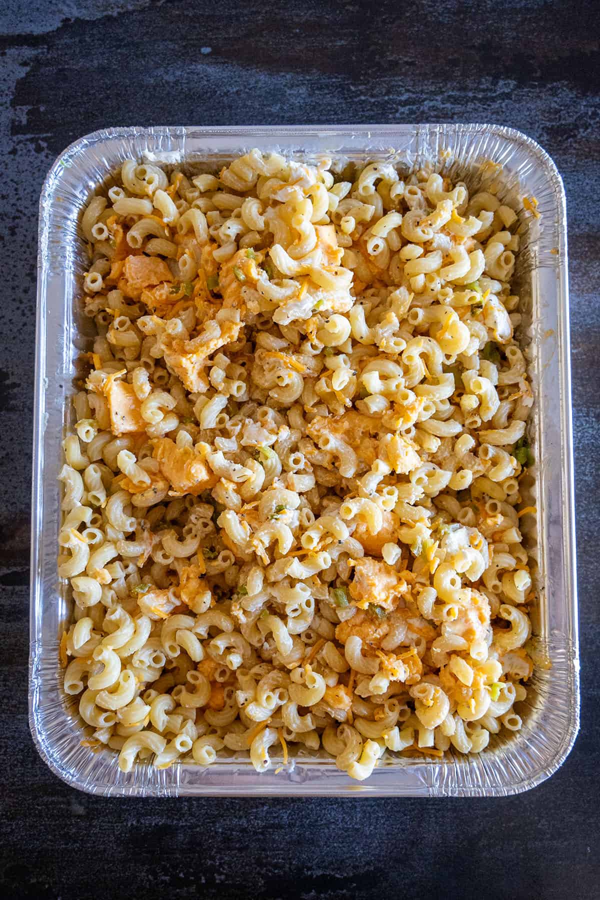 Elbow macaroni mixed with cheeses, chiles and spices.