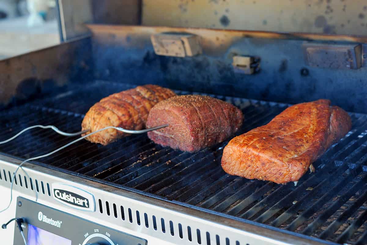 turkey breast, roast beef and pork loin on smoker. 