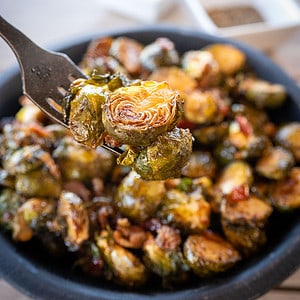 forkful of Balsamic Glazed Brussels Sprouts with Bacon.