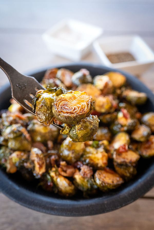 forkful of Balsamic Glazed Brussels Sprouts with Bacon.