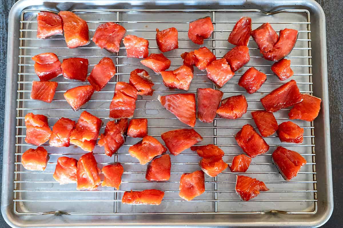 salmon cubes on rack air drying.