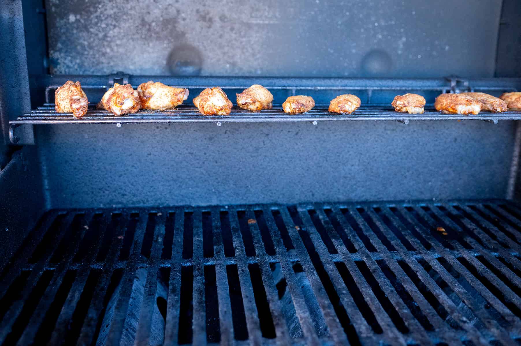 chicken wings on gas grill.