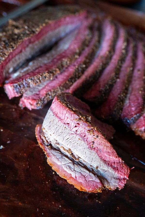 Brisket slice with thick smoke ring.