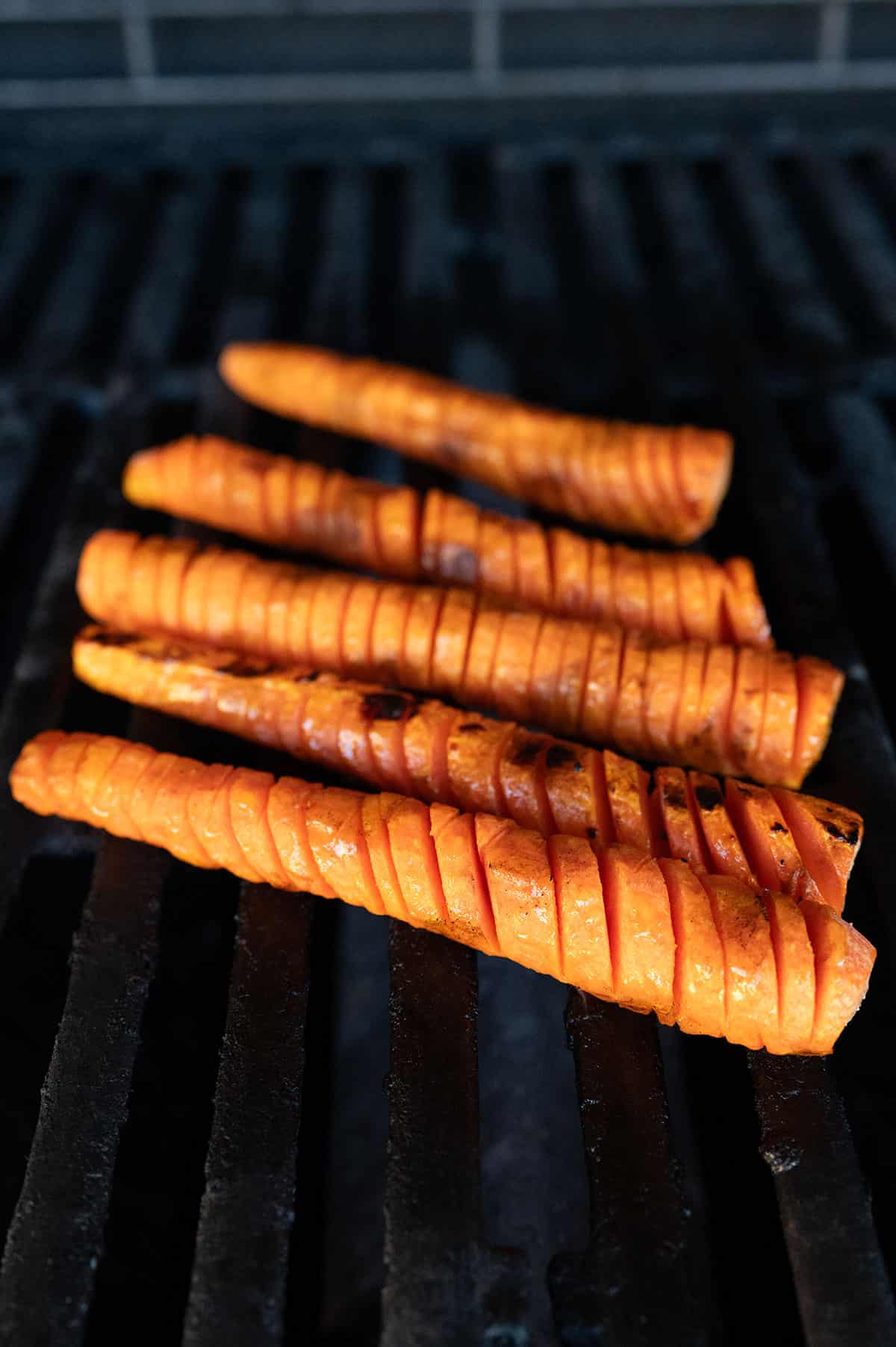 Spiral-cut carrots charred on grill.
