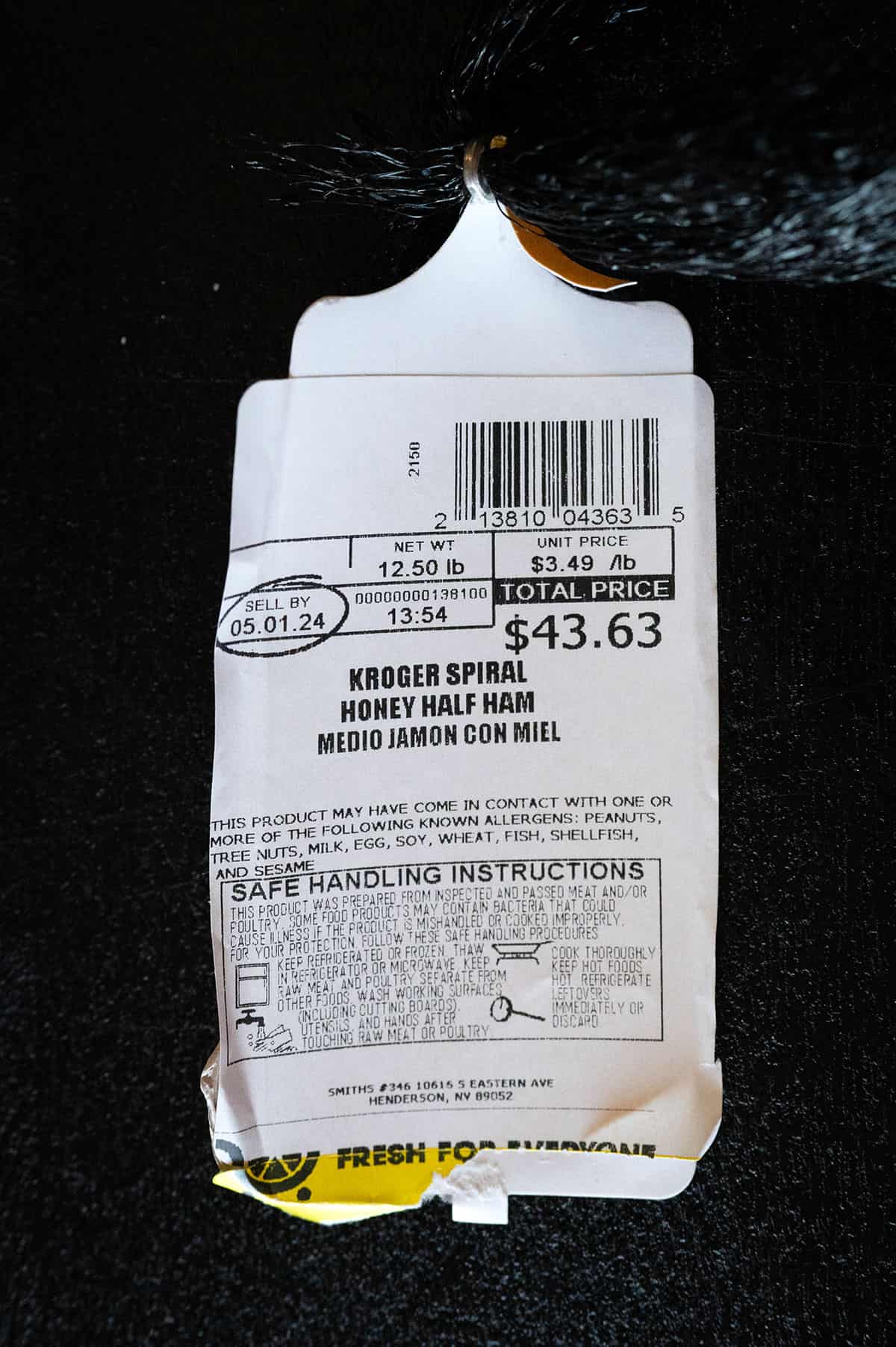 ham label showing weight and price per pound.