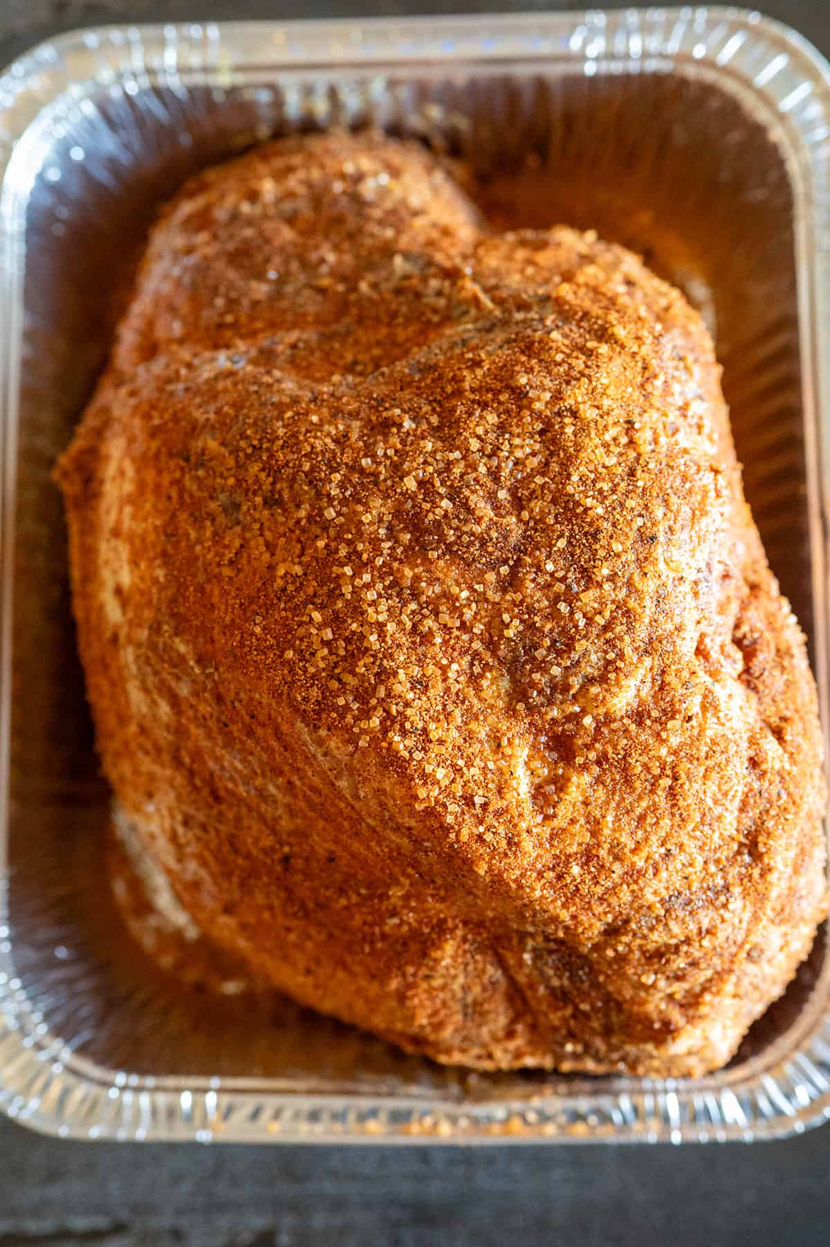 Ham rubbed with mustard and BBQ rub.