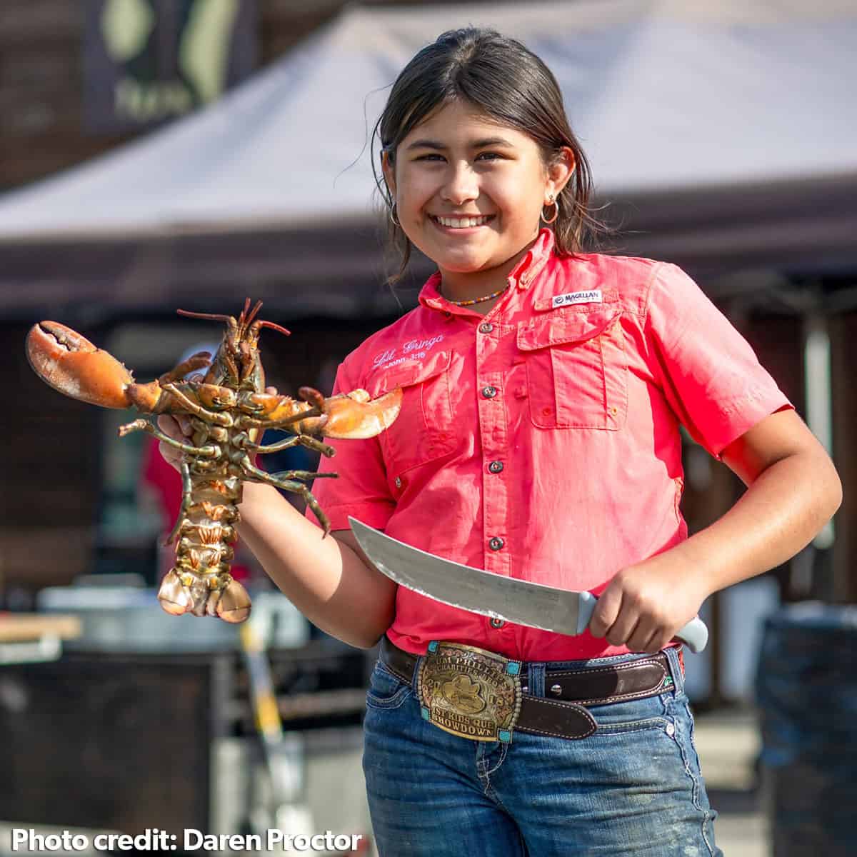 Raelyn Barker holding a lobster