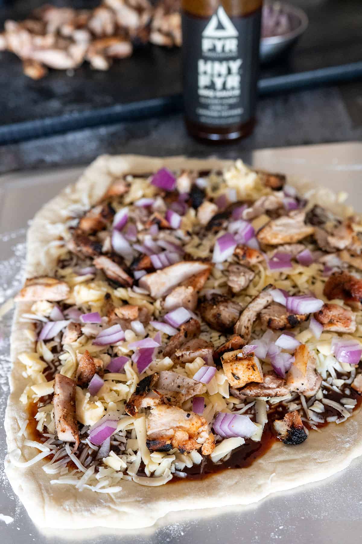 Whole pizza with barbecue chicken.