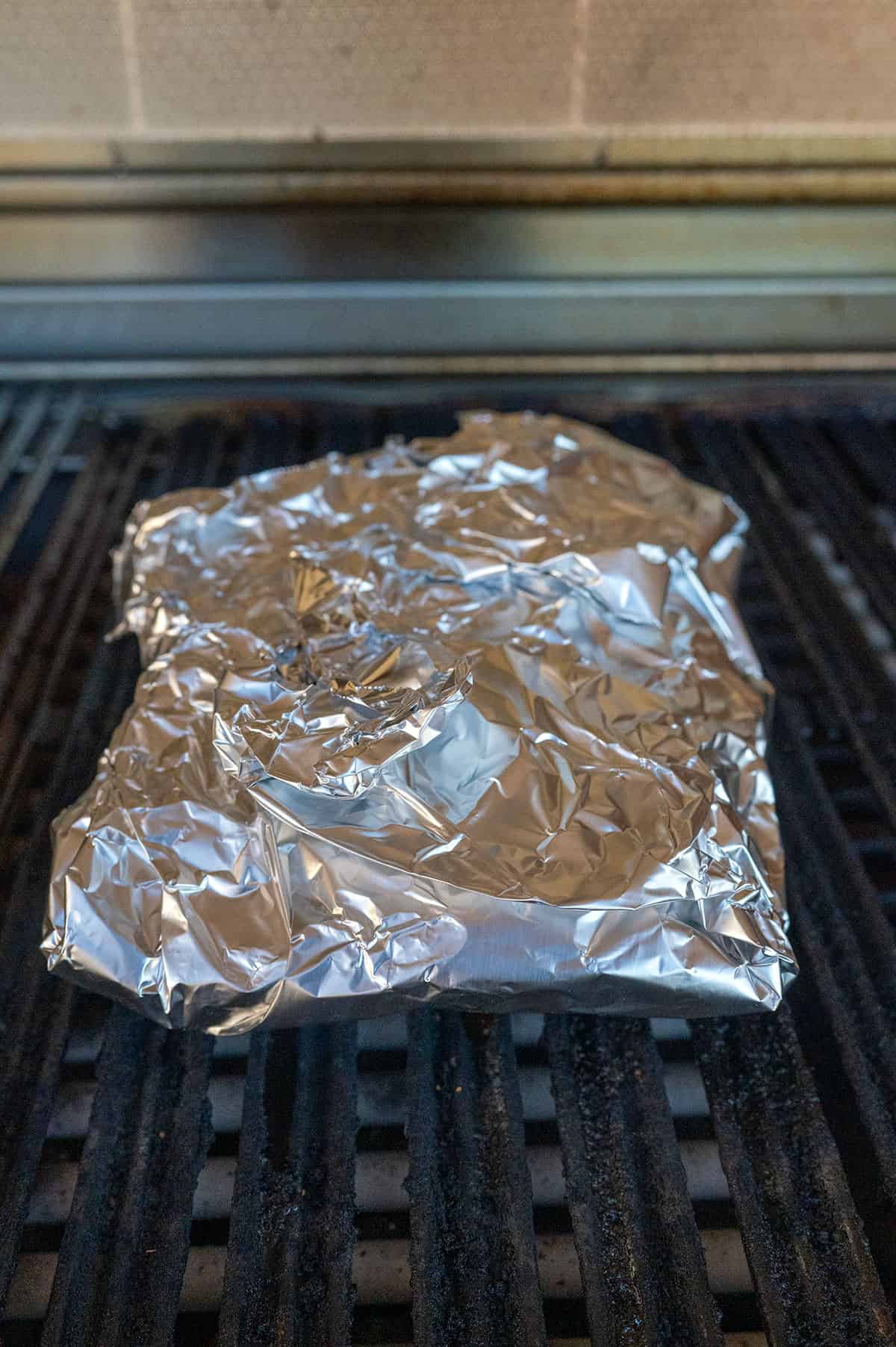 Wrapped brisket on gas grill.