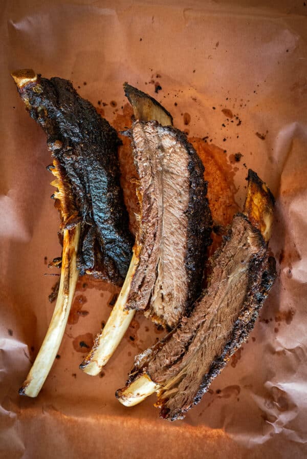 3 bones of smoked beef plate ribs.