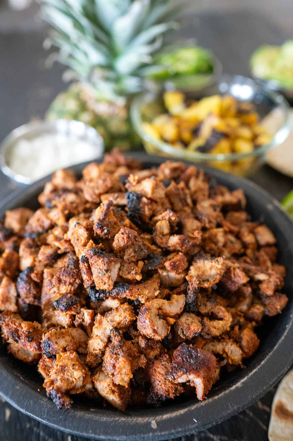 Cooked al pastor meat.