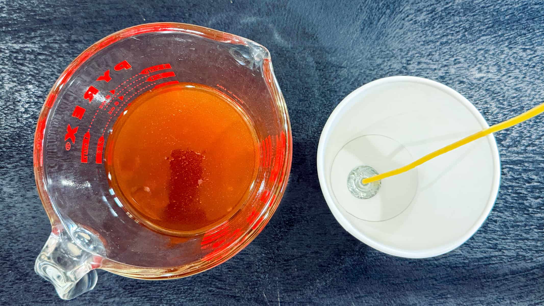 Cinnamon coconut oil and cup with wick.