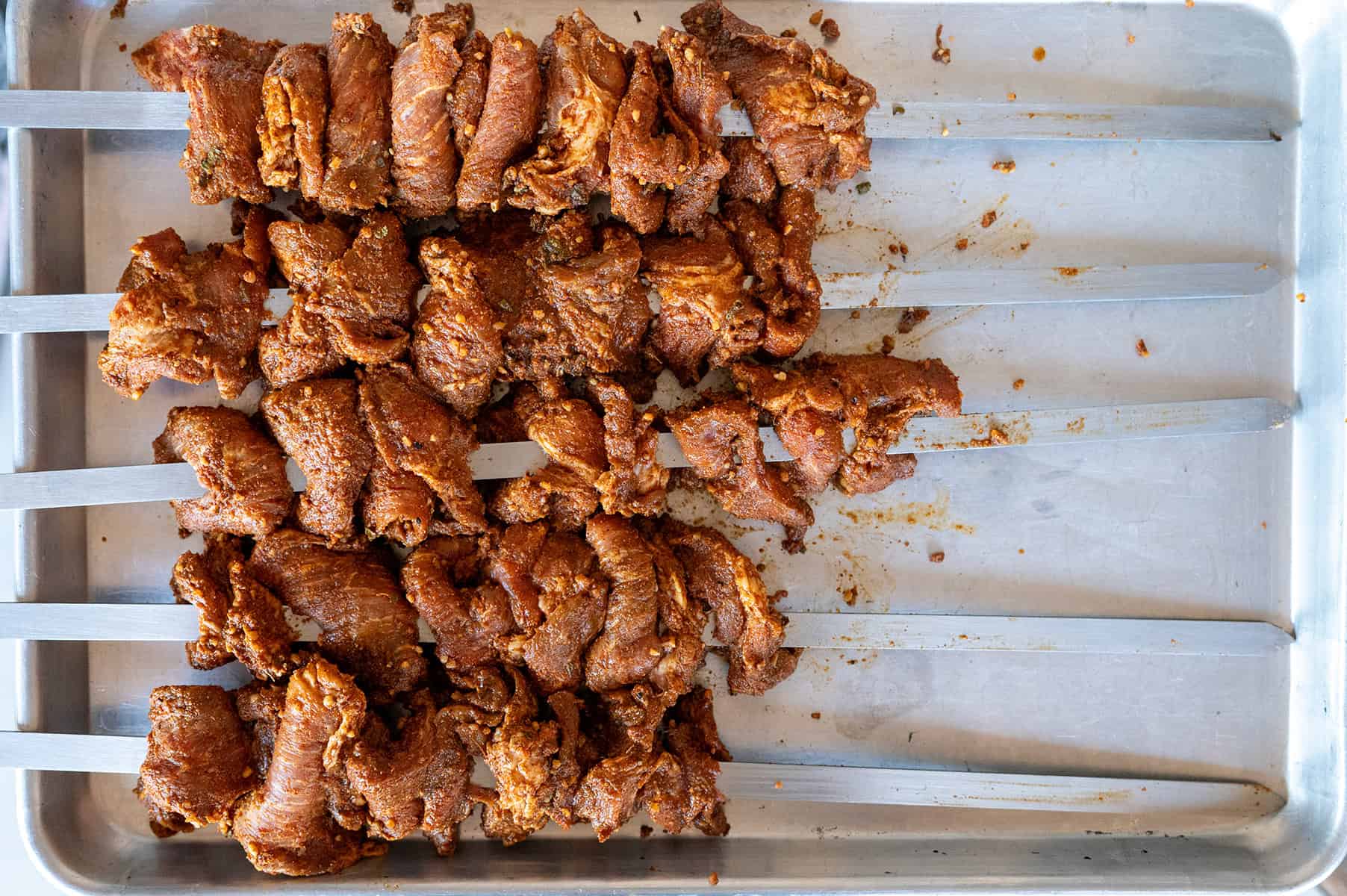 marinated pork on skewers.