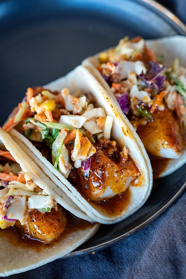 Cajun honey butter sauce fish tacos.