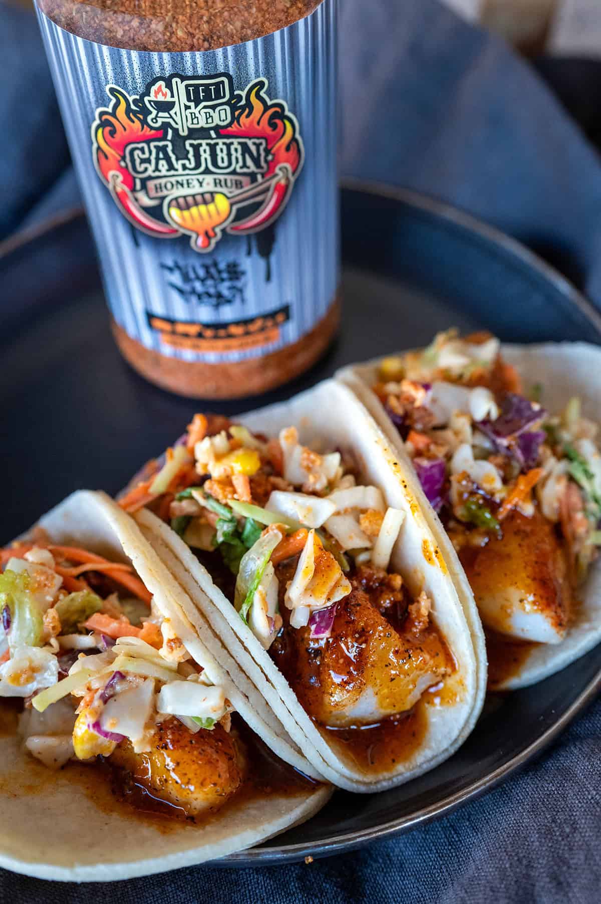 Cajun honey butter sauce fish tacos.