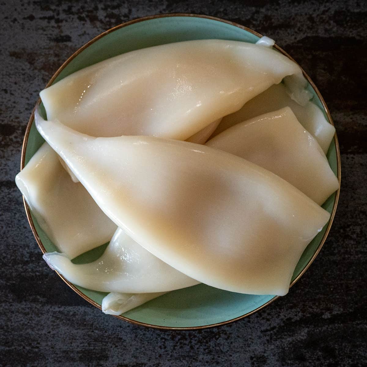 Squid tubes on a plate.