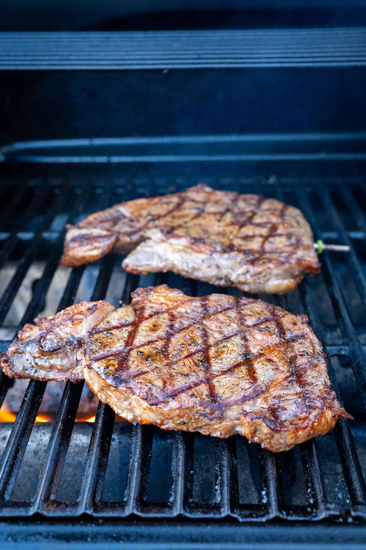 ribeye steaks on the grill.