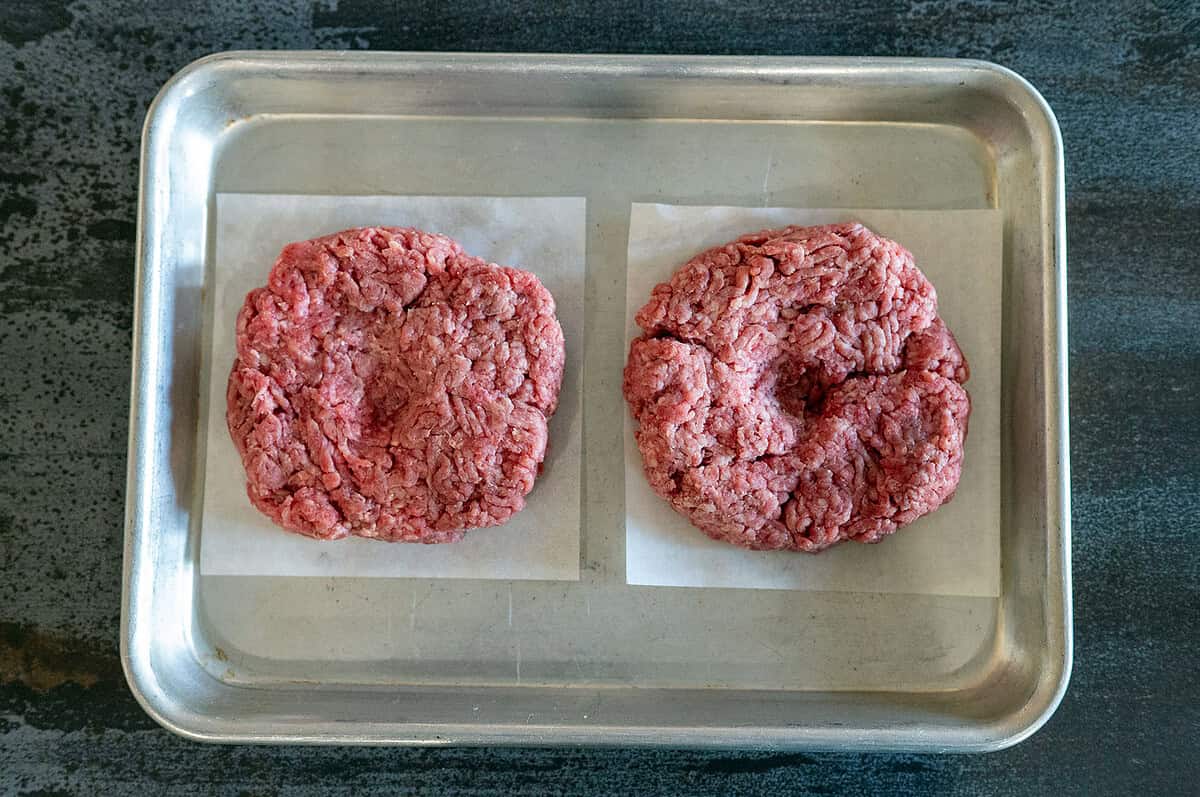 2 burger patties with a dimple.