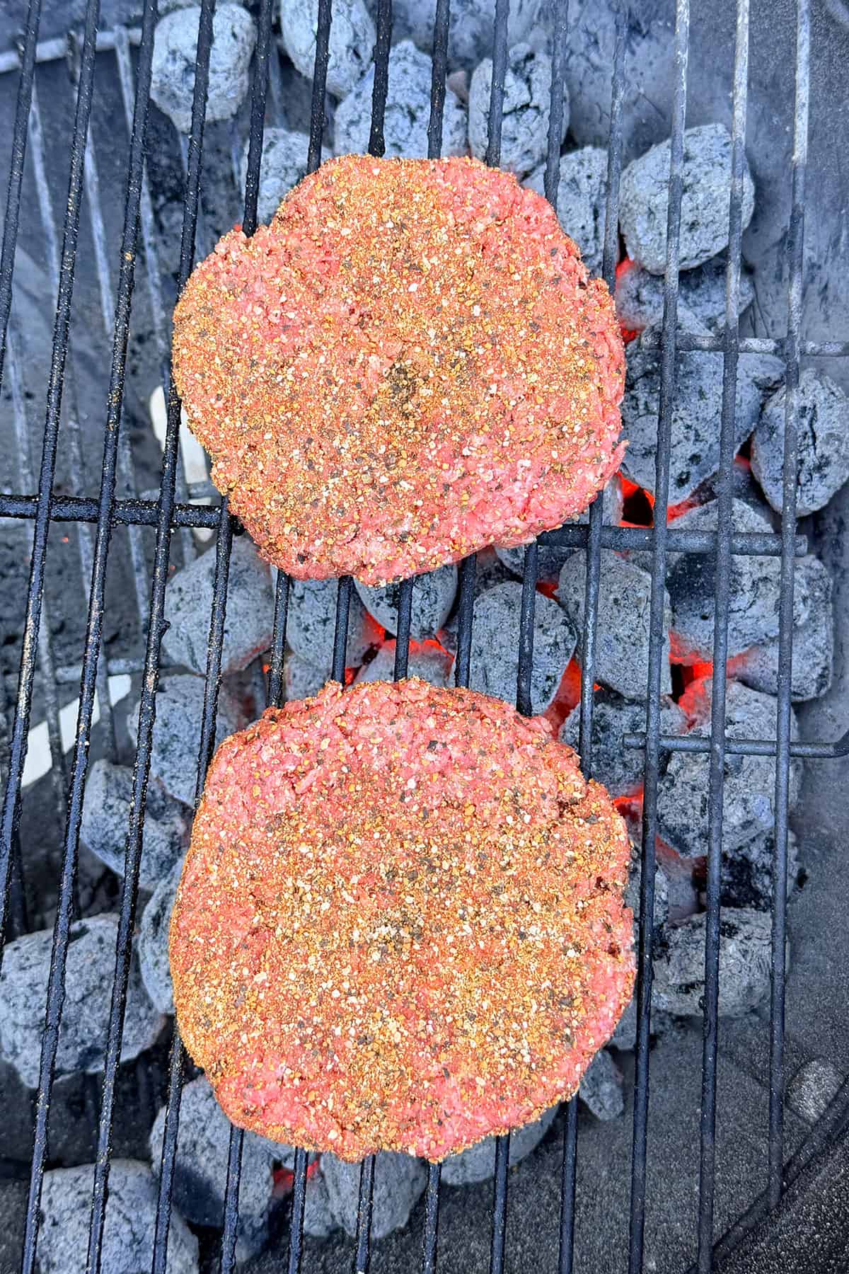 burger patties on grill.