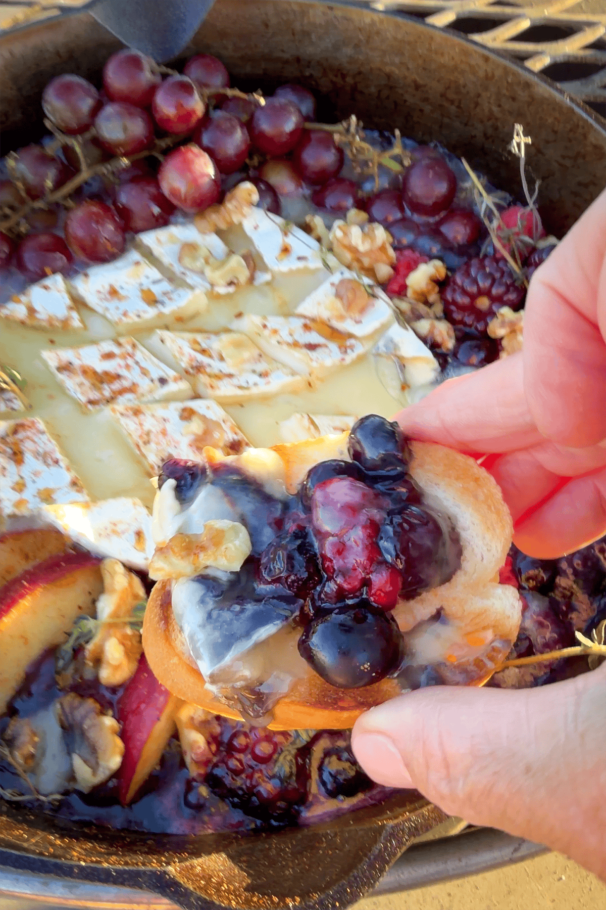 Campfire brie cheese dip on toasted baguette.