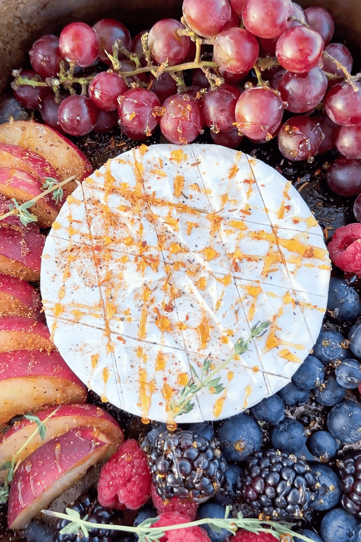 Brie cheese seasoned with Girls Can Grill Chicken Rub.